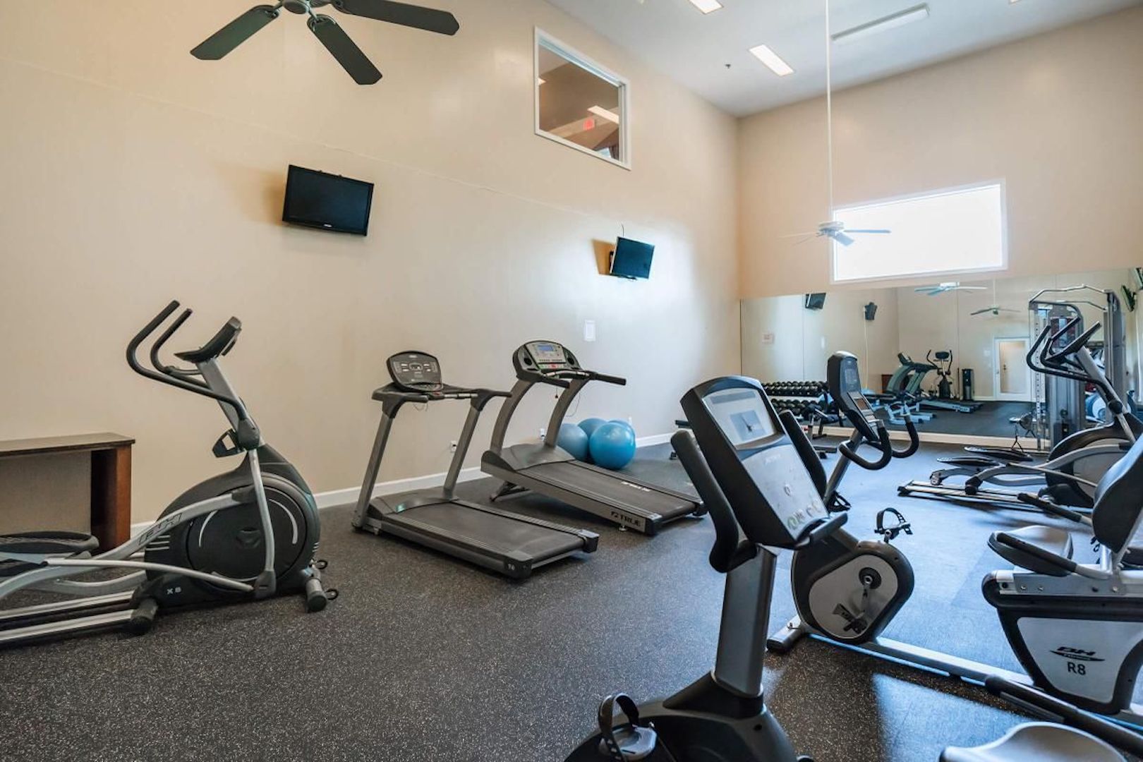 plenty of exercise machines in fitness center