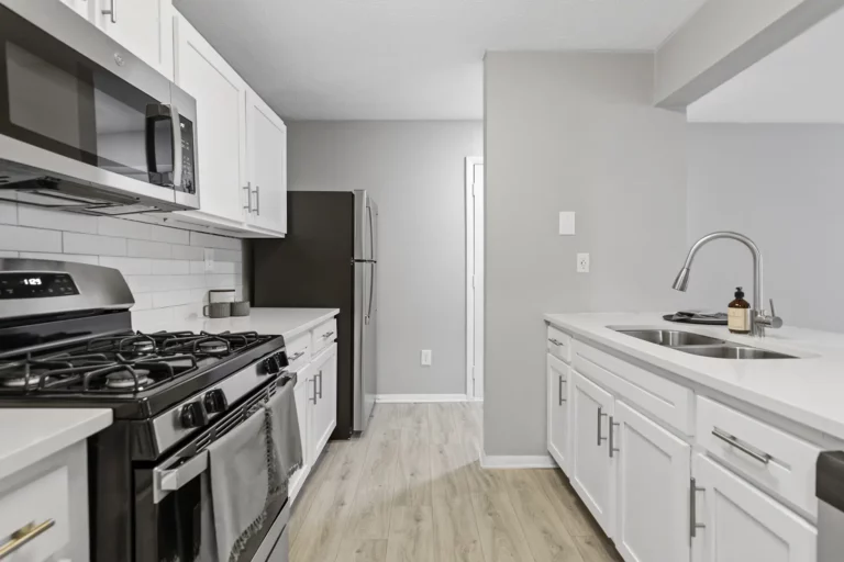 newly renovated kitchen with hardwood finish flooring