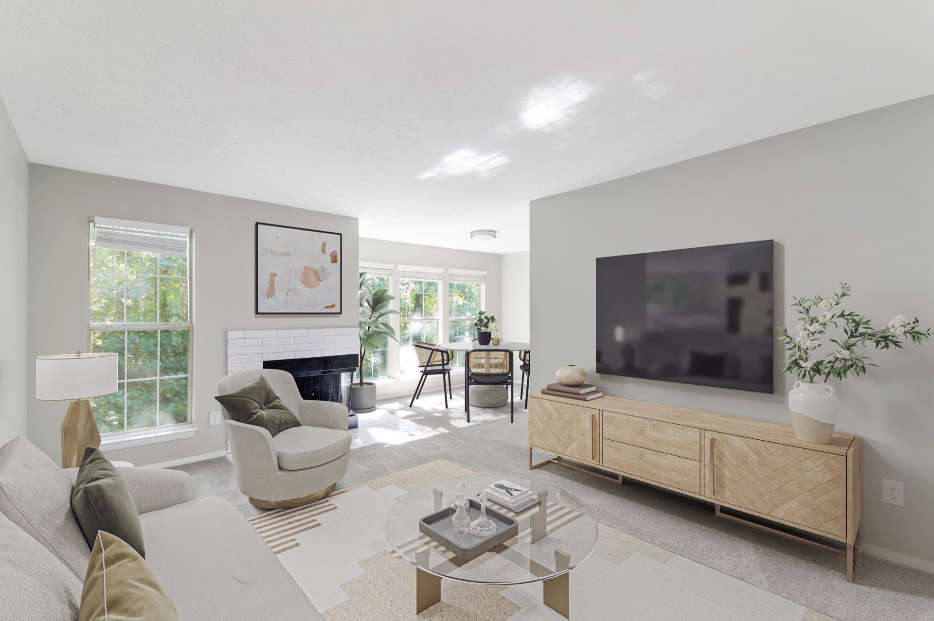 Living room with fireplace and large windows