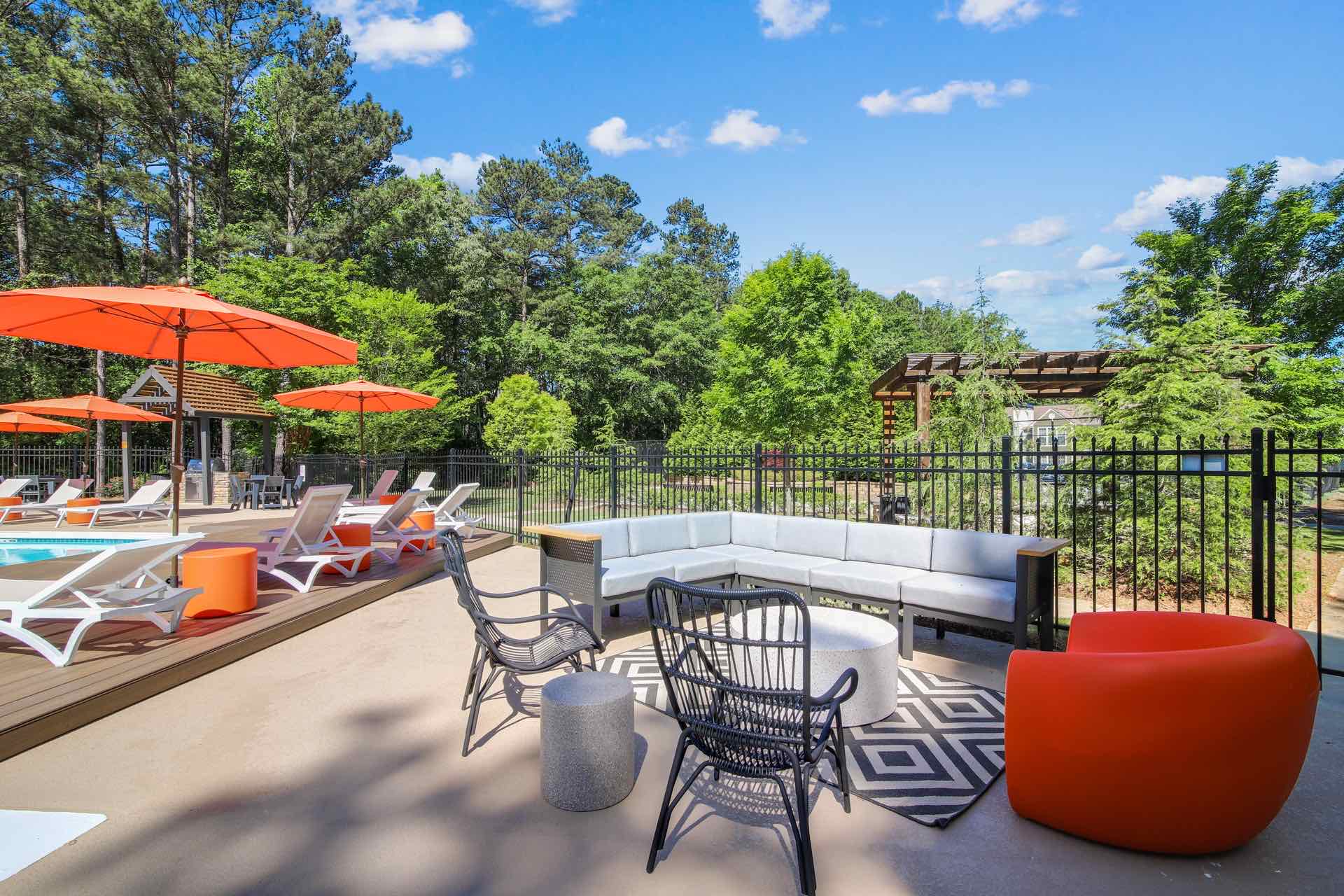 Outdoor lounge area by the pool